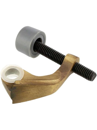 Brass Hinge Pin Door Stop in Antique Brass.